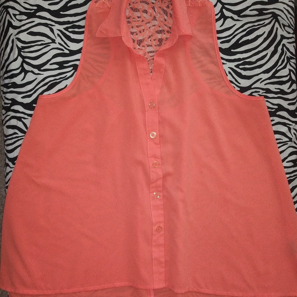 Women's button down sleeveless blouse.